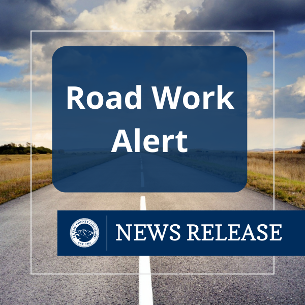 A image of an empty road with text that reads road work alert. News release